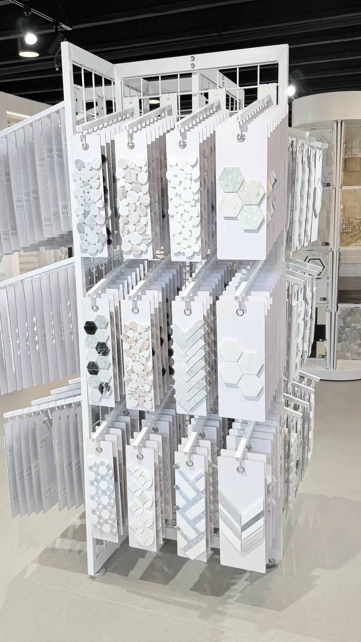 A rotating sample tower carrying mosaic, hexagon and patterned tile