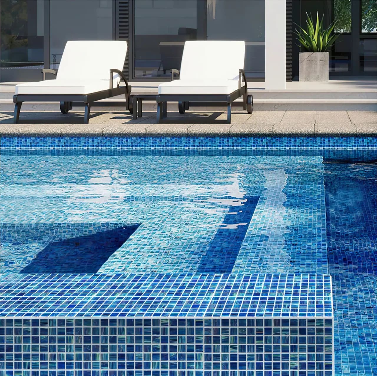 Indoor pool with mosaic waterfall feature